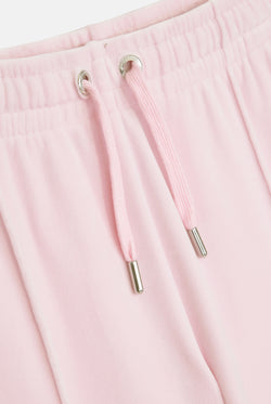 Displays the Almond Blossom 'Juicy' branded velour diamanté tracksuit bottom 