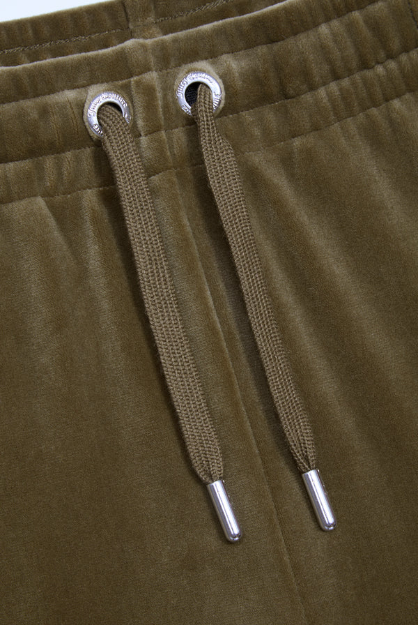 Displays the Dark Olive 'Juicy' branded velour diamanté tracksuit bottom