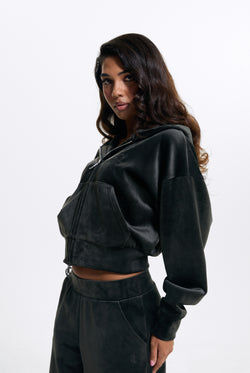 Displays a model wearing the Raven 'Juicy' branded Velour Bonded Hoodie