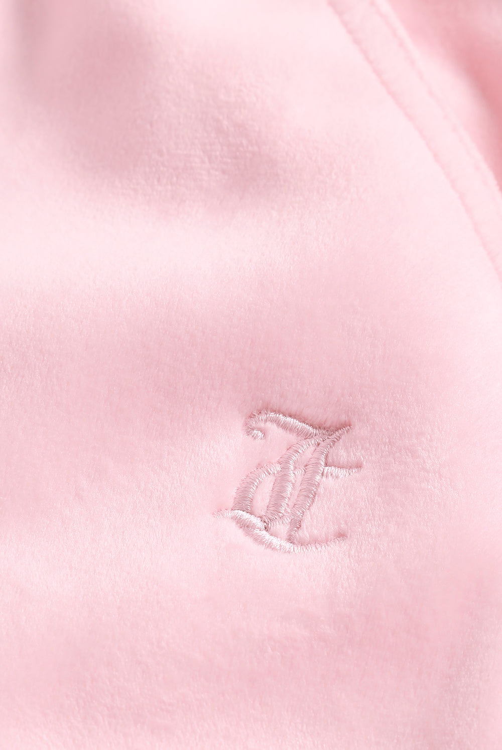 Displays the Cherry Blossom 'Juicy' branded Velour Bonded Tracksuit Bottom featuring the juicy branding 