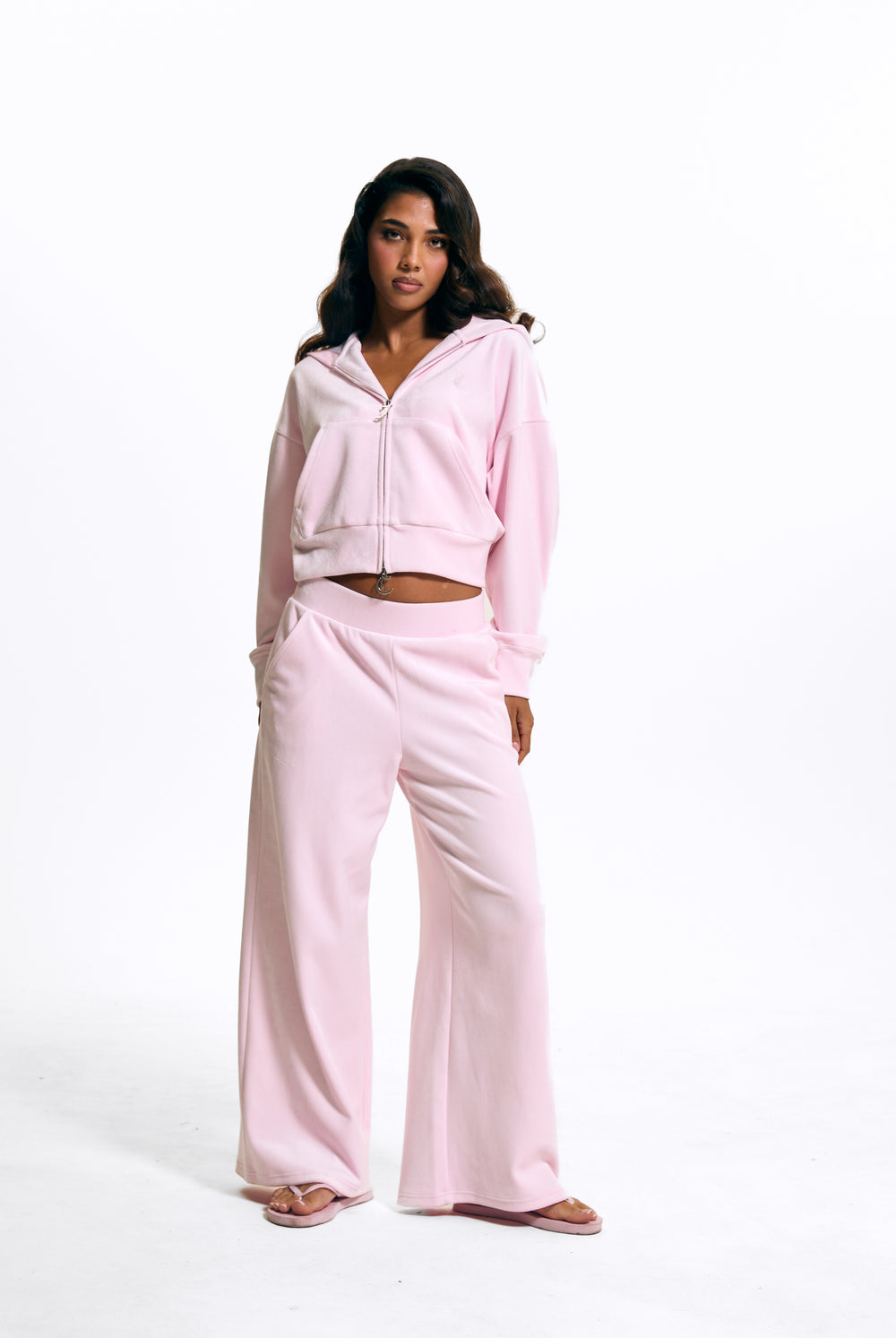 Displays a model wearing the Cherry Blossom 'Juicy' branded Velour Bonded Tracksuit Bottom