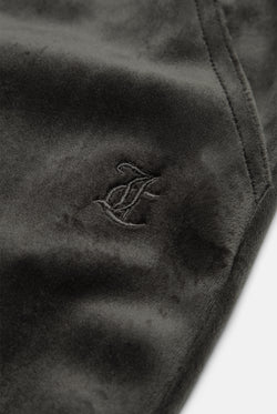 Displays the Raven 'Juicy' branded Velour Bonded Tracksuit Bottom featuring the juicy branding 