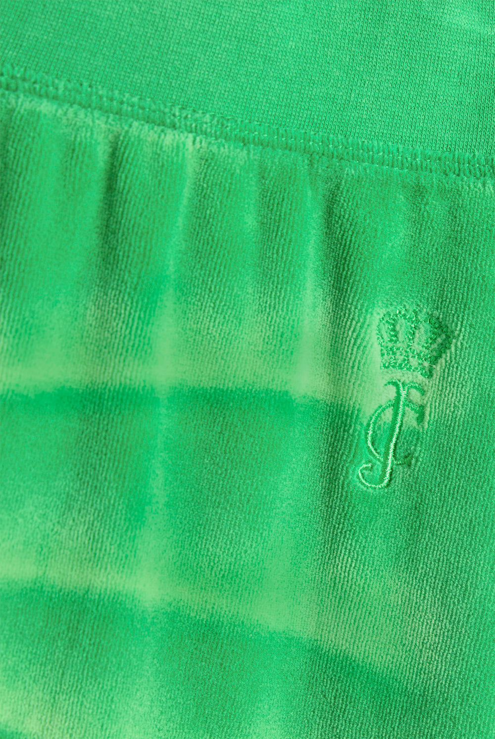 Displays the Jolly Green washed 'Juicy' branded OG straight track pant featuring the juicy Couture logo