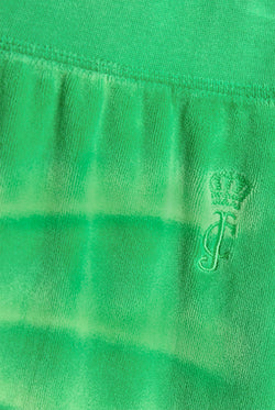 Displays the Jolly Green washed 'Juicy' branded OG straight track pant featuring the juicy Couture logo