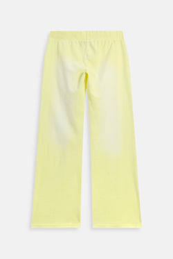 Displays the Yellow pear washed 'Juicy' branded OG straight track pant 