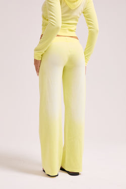 Displays the Yellow pear washed 'Juicy' branded OG straight track pant 
