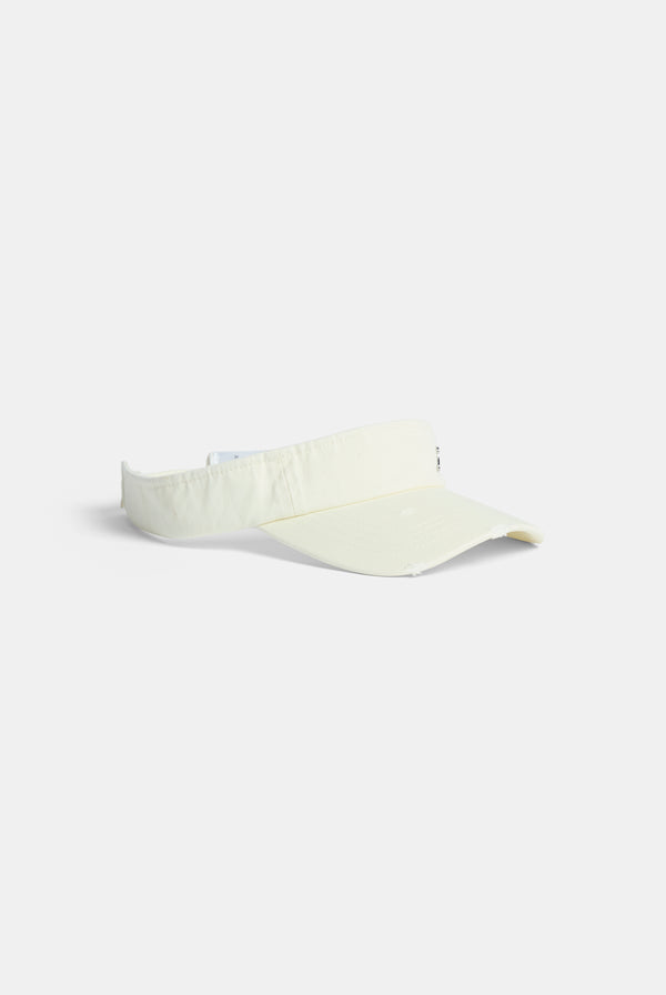 Displays the ecru distressed 'Juicy' branded cotton denim visor 