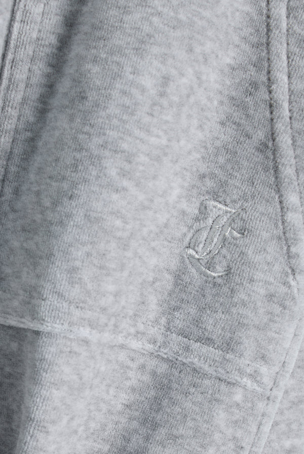 Displays the silver marl wide leg 'Juicy' branded cotton velour track pant featuring the juicy logo