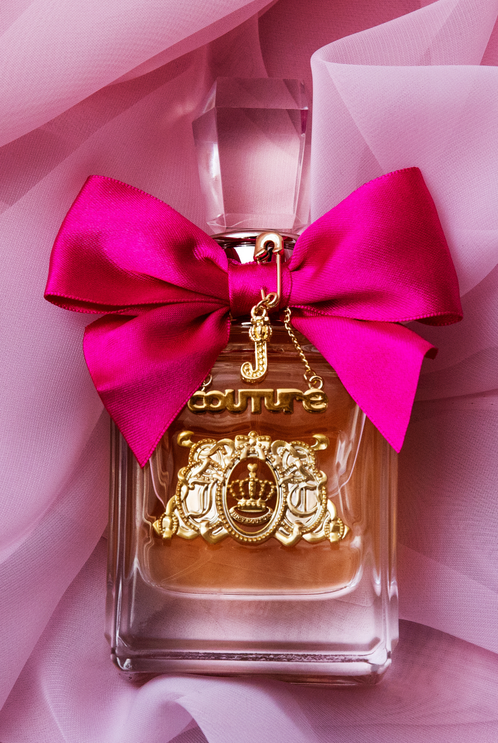 Displays the 'juicy' branded Viva La Juicy EDP 100ml bottle