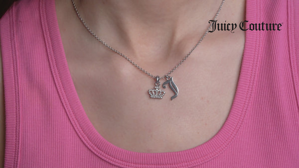 Displays a model wearing the 'juicy' Silver Tone Crystal Motif Crown & J Charm Pendant
